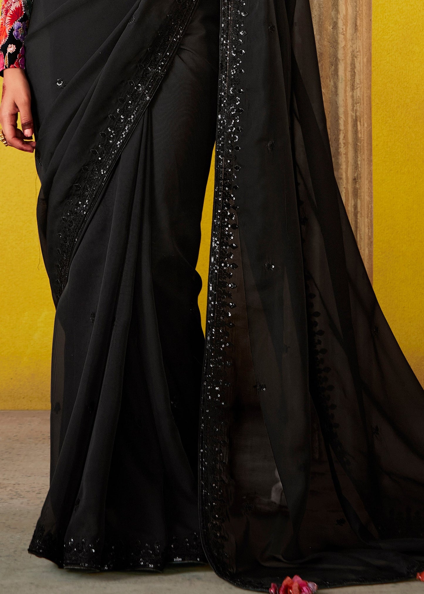 Elegant Black Saree with Vibrant Floral Multicolour Blouse