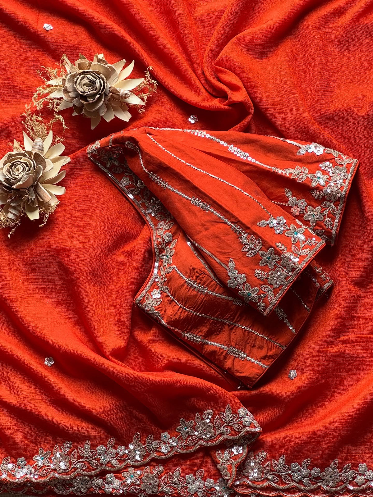 Siena Orange Soft Tissue Silk floral border Designer Saree