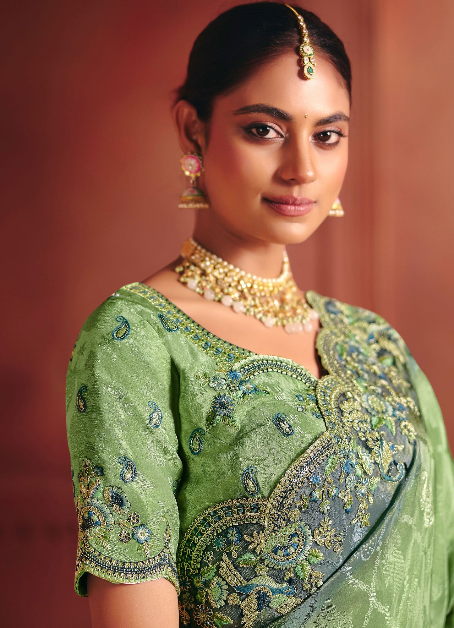 Leaf Green With Teal Blue Embroidered Border Zari Viscose Tissue Saree With Dusty Green Blouse