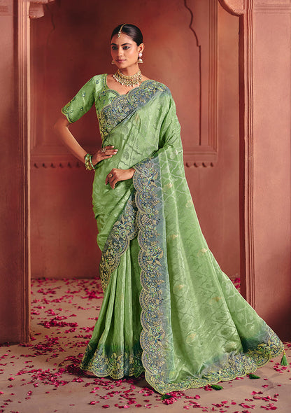 Leaf Green With Teal Blue Embroidered Border Zari Viscose Tissue Saree With Dusty Green Blouse