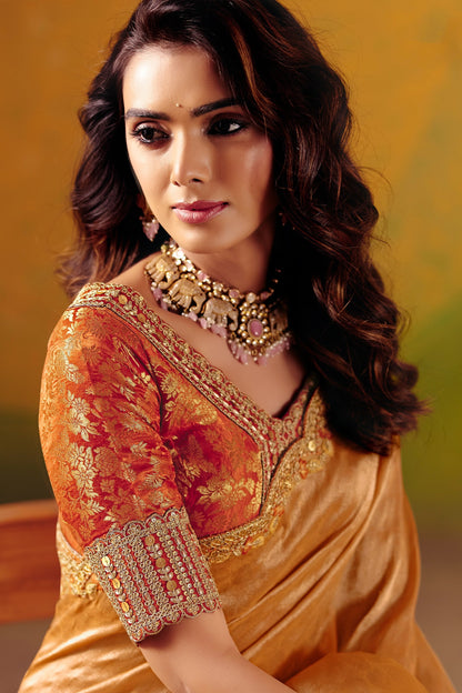 Orange Zari Viscose Tissue Saree With Orange Embroidered Silk Stitched Blouse